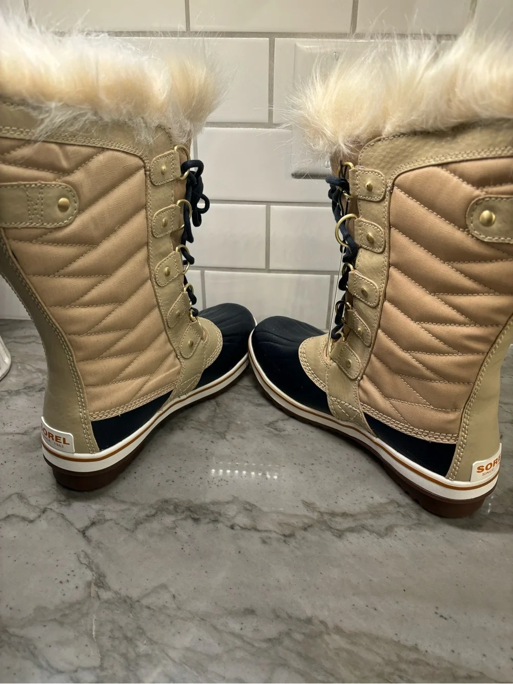 Sorel Women’s Torino Winter Lace-Up Boots in Beige and Black with Faux Fur Trim